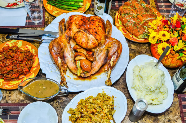 table set up before thanksgiving dinner