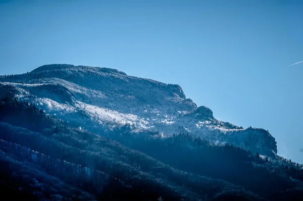 Profile of grandfathers mountain in snow near sugar mountain nc
