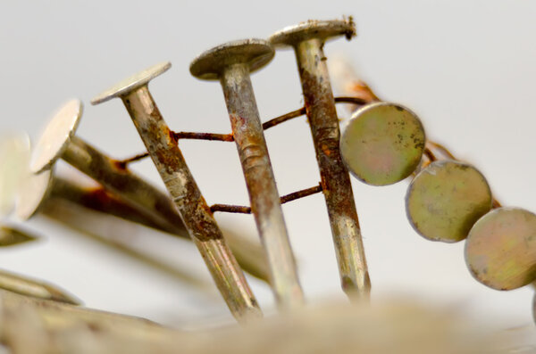 construction nails for a nail gun on a gray background
