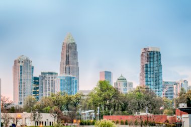 early morning sunrise over charlotte city skyline downtown clipart