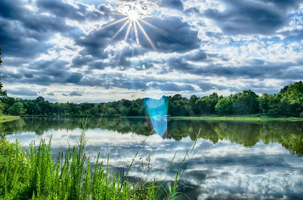 Silent lake at sunset in remote location — Stock Photo, Image