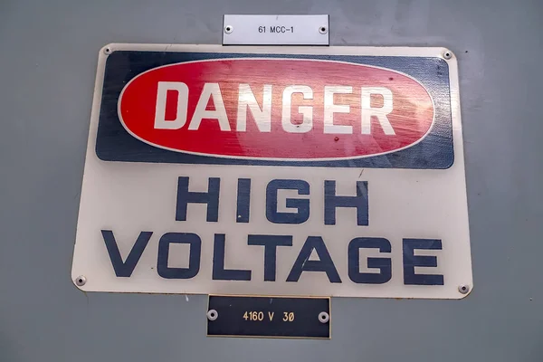 danger high voltage sign at power plant