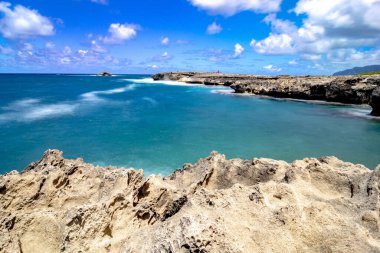 laie sea arch and rocky cliff beach in oahu hawaii