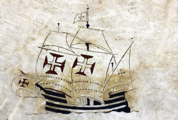 Detail of a caravel at the wind rose in marble near the Monument