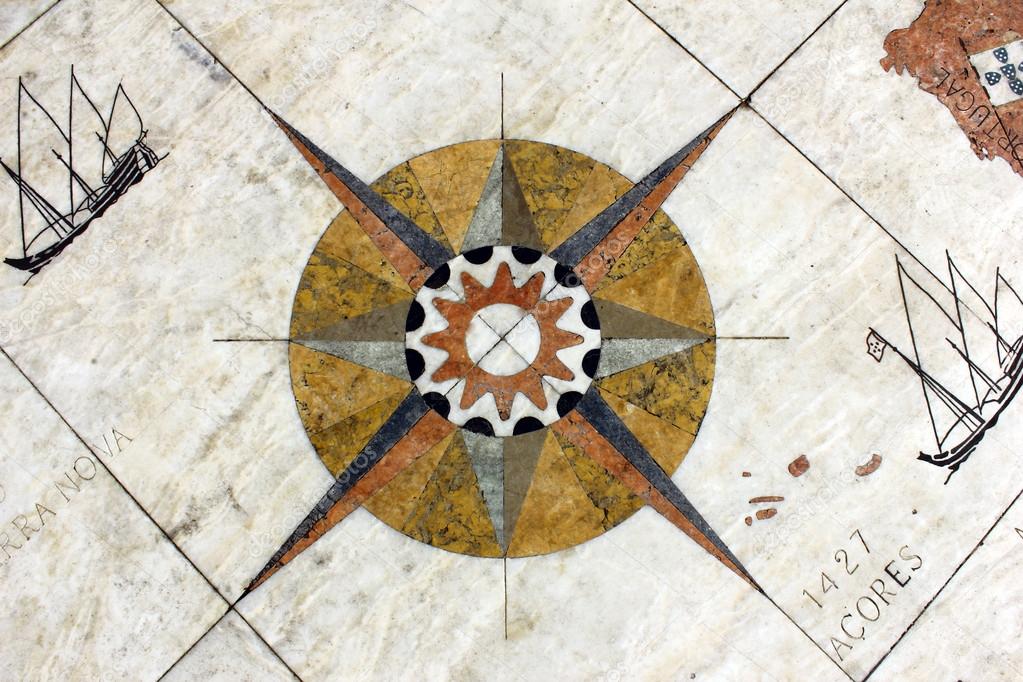 Detail of a wind rose in marble near the Monument to the portugu