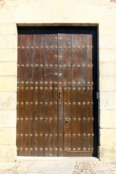 Detail van een deur caceres, Spanje — Stockfoto