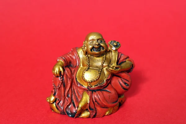 Buddha little statue with red background — Stock Photo, Image