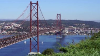 The 25 de Abril Bridge is a suspension bridge connecting the city of Lisbon, capital