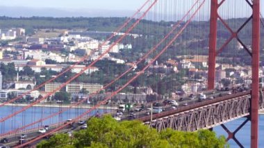 The 25 de Abril Bridge is a suspension bridge connecting the city of Lisbon, capital