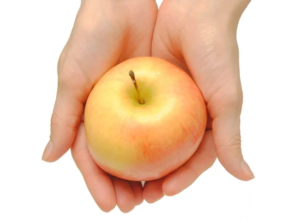 Hand och äpple — Stockfoto
