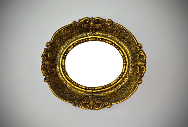 Moldura de metal vintage de ouro com ornamentos — Fotografia de Stock