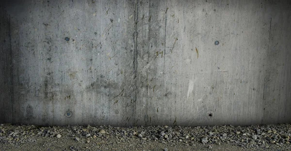 Betonnen wand textuur met grind vloer Rechtenvrije Stockfoto's