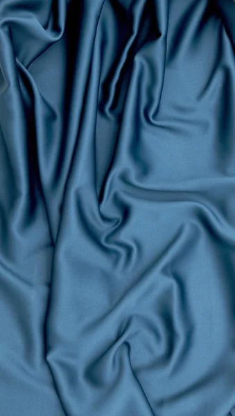 Textur aus blauer Seide — Stockfoto