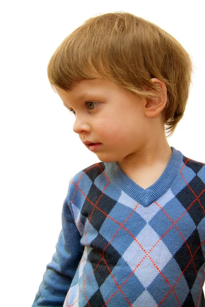 Băiatul arată deoparte într-un pulover — Fotografie, imagine de stoc