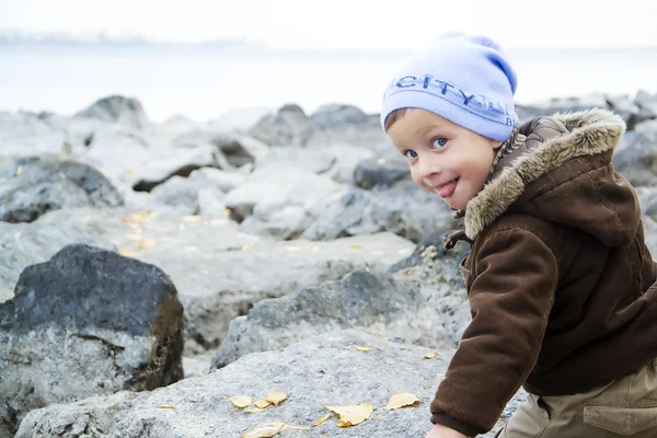 Little cute kid on river — Stock Photo, Image