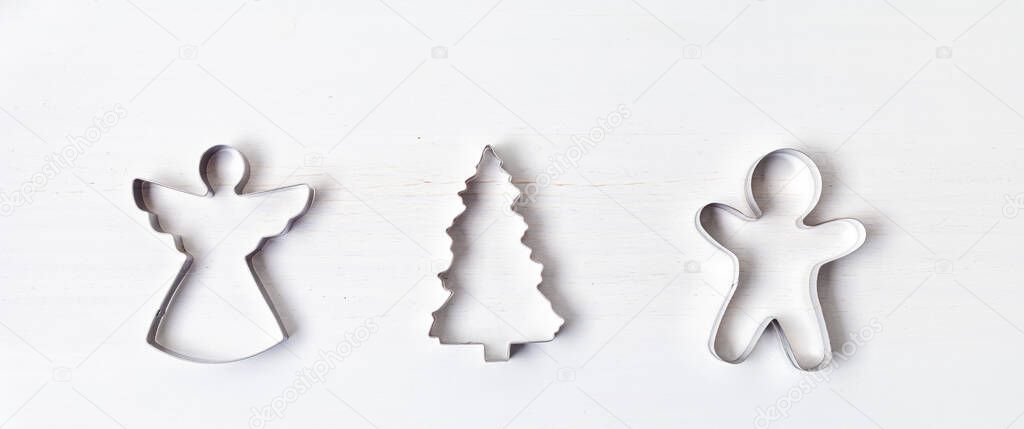 Christmas cookies cutters, traditional biscuits molds for winter holidays. Homemade dessert. Flat lay, top view