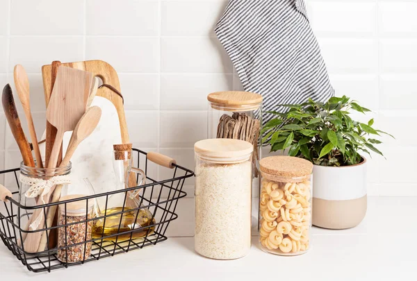 Assortment Grains Cereals Pasta Glass Jars Kitchen Utensils Wooden Table — Stock Photo, Image