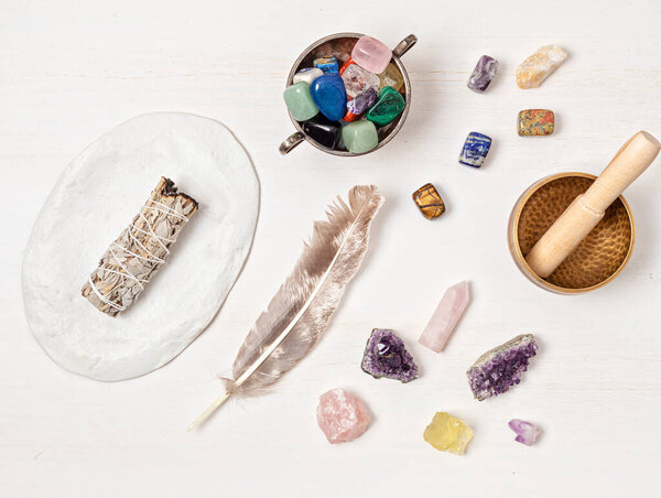 Smudge kit with white sage, palo santo, abalone sea shell. Natural elements for cleansing environment from negative energy, adding positive vibes. Spriritual practices, witchcraft concept