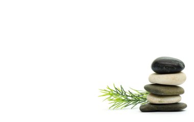 Stacked stone on white background with rosemary clipart