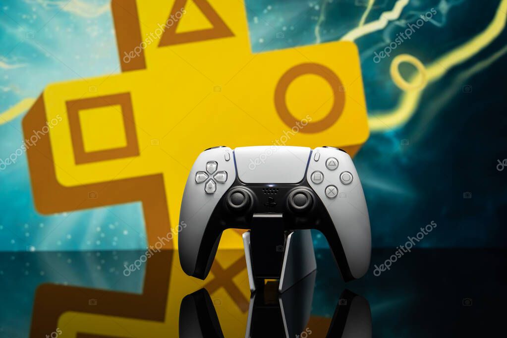 May 16, 2020, Odessa, Ukraine. White new Playstation 5 gamepad with Playstation Plus on screen, selective focus. Dark background.