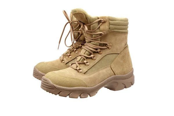 Modern army combat boots. New desert beige shoes. Isolate on a white background.