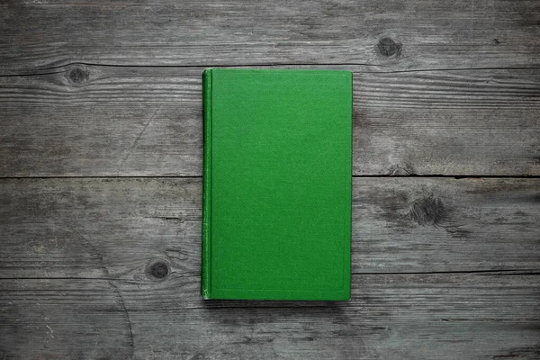 Closed Book Old Wooden Table Green Hard Cover Vintage Background — ストック写真