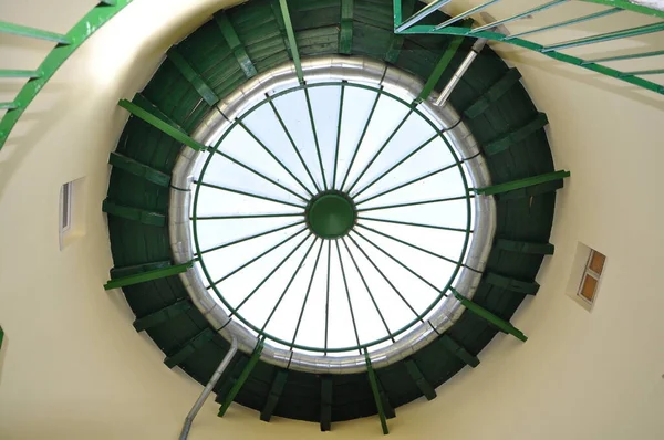 Beautiful design of the ceiling window.The large circular ceiling window above the entrance to the old building in Rijeka city, Croatia