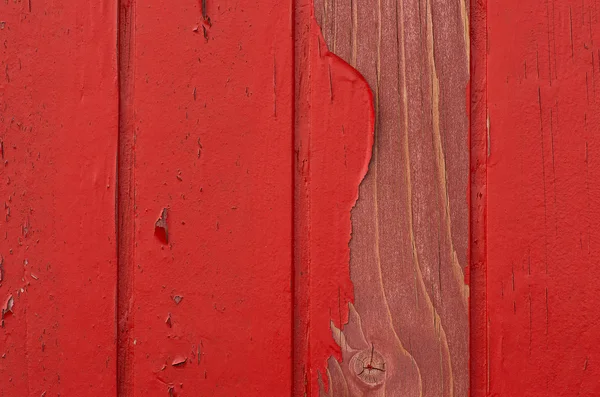 Rotes Holz mit beschädigter Farbe — Stockfoto