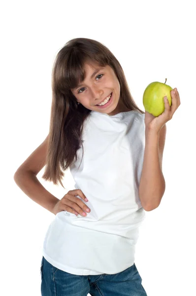 Счастливая девушка с яблоком на белом фоне — стоковое фото