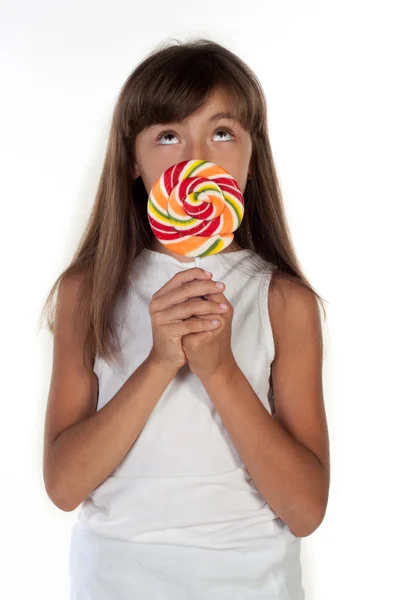 Sevimli küçük kız büyük lolly pop holding — Stok fotoğraf