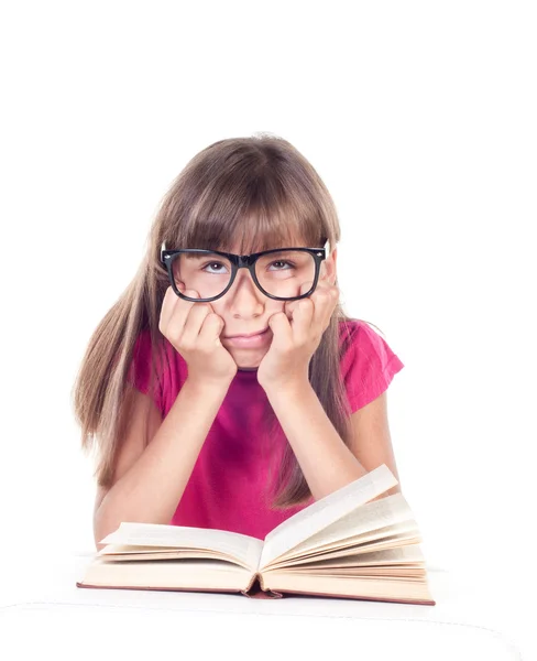 Little girl with books wearing glasses — Stock Photo, Image