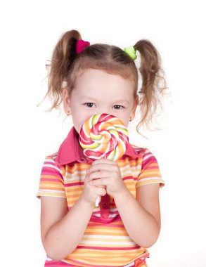 sevimli küçük kız büyük lolly pop holding