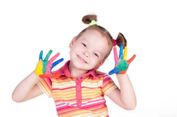 Hermosa niña con las manos en la pintura —  Fotos de Stock