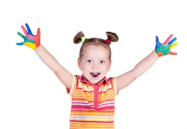 Lächelnd schönes kleines Mädchen mit Händen in der Farbe — Stockfoto