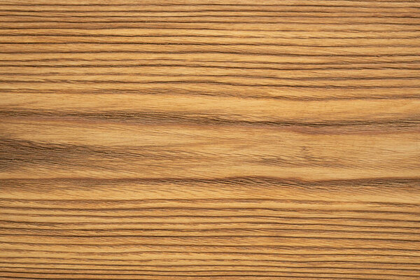The appearance of oak-colored pine wood. Brushed board. Creative vintage background.