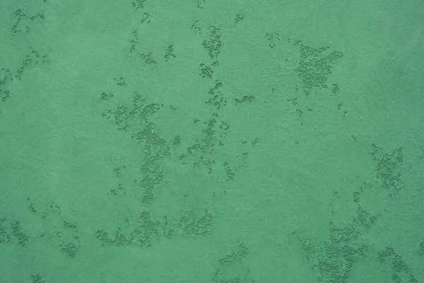 緑色の構造石膏。緑の壁を織物。壁の装飾オプション。創造的なヴィンテージの背景. — ストック写真