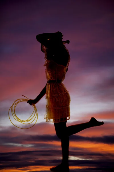 Silhouette standing rope sunset — Stock Photo, Image