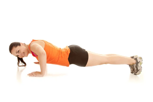 Vrouw sideorange push-up — Stockfoto