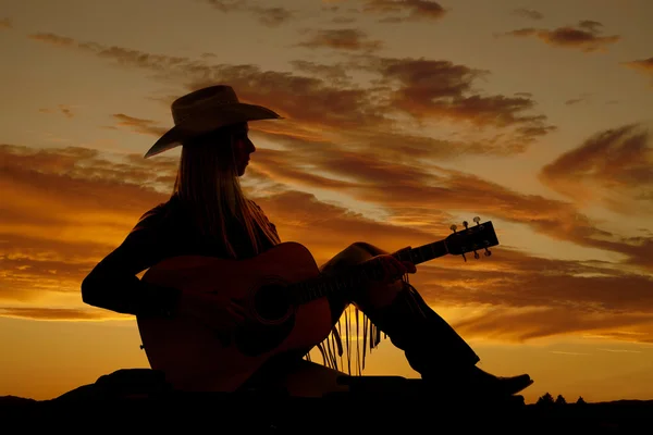 Cowgirl play guitar silhouette — Stock Photo, Image