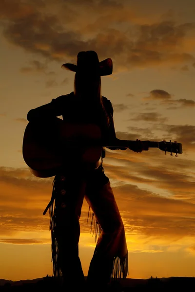 Mulher stand com silhueta de guitarra — Fotografia de Stock