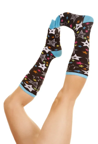 Jambes étoiles chaussettes toucher — Photo