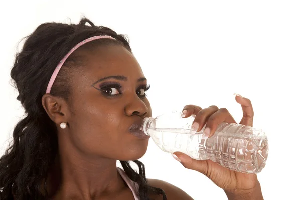 Woman drinking from bottle — Stock Photo, Image