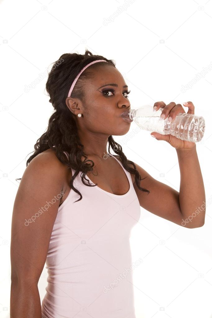 African woman drinking bottle
