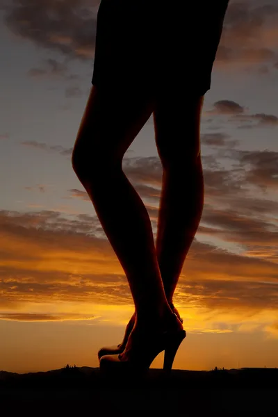 Jambes talons coucher de soleil — Photo