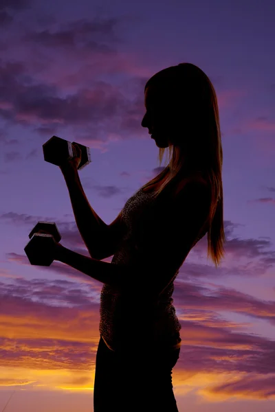 Woman curling sunset silhouette — Stock Photo, Image