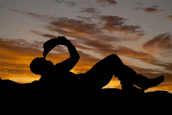 Cowboy legt Silhouette — Stockfoto