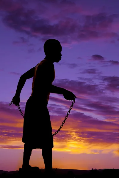 Silhouette man hold chain — Stock Photo, Image
