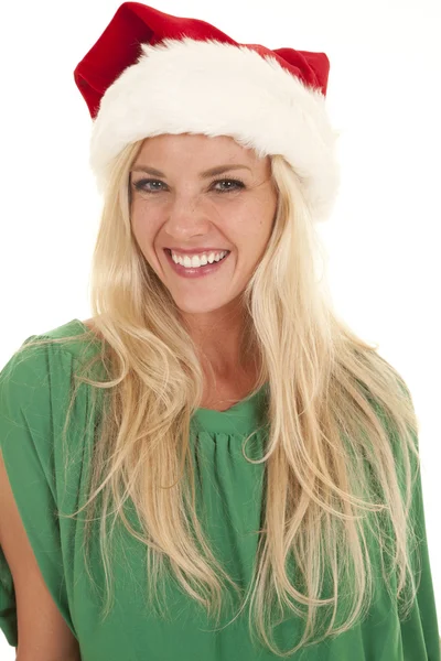 Žena zelený top santa hat úsměv — Stock fotografie