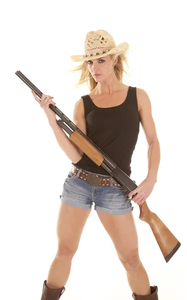 Vrouw veedrijfster met shotgun — Stockfoto