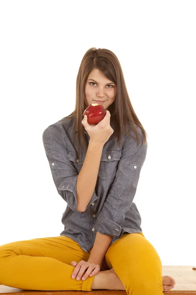 Eyebrow up eat apple — Stock Photo, Image